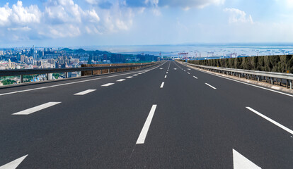 Fototapeta premium Empty asphalt road and city skyline and building landscape, China.