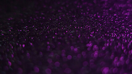 Dark abstract blurred background with bokeh. Blurred lights, glitter scattering, neon glow