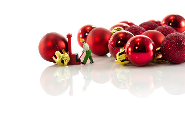 man bringing the christmas balls