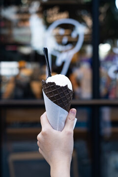 Hand Holding Scoop Ice-cream Turkey On Walking Street. Refreshing Concept.