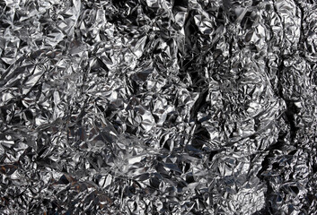 close-up aluminum foil texture abstract dark background