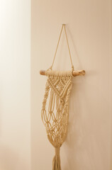 boho macrame decoration hanging on the wall