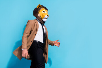 Profile side photo of weird incognito guy lion mask go unusual theme festive occasion isolated over blue color background