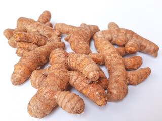 Turmeric or Curcuma longa rhizomes. isolated on white background