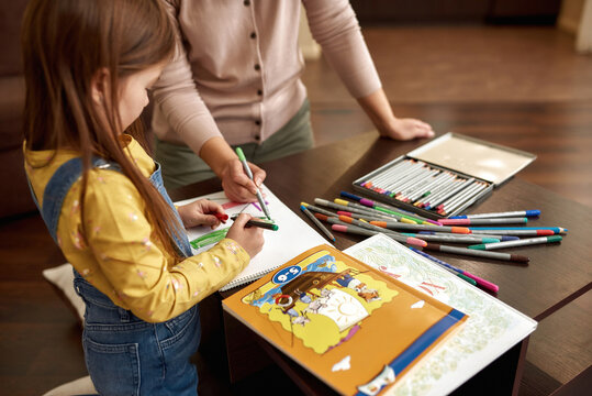 Early childhood education. Artistic child drawing, top view