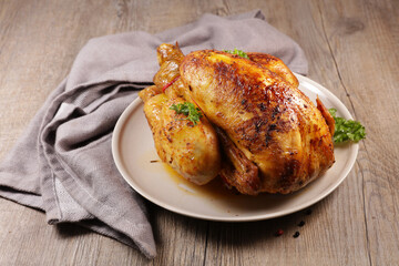 roasted poultry and sauce in plate