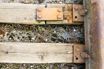 Close-up photo of an old wooden railway. Train and nature concept. Abstraction