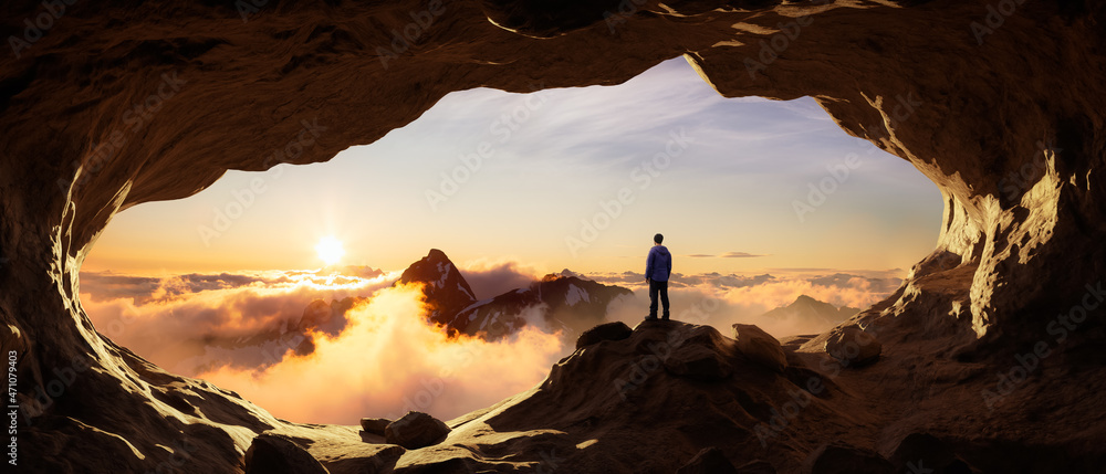 Wall mural adventurous man hiker standing in a cave with rocky mountains in background. adventure composite. 3d