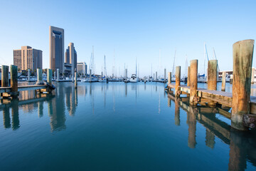 Fototapeta premium The pier in downtown of Corpus Christi against the background of skyscrapers
