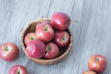 mini red apple isolated on white background.