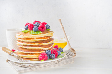 Pancakes stack with fresh berries