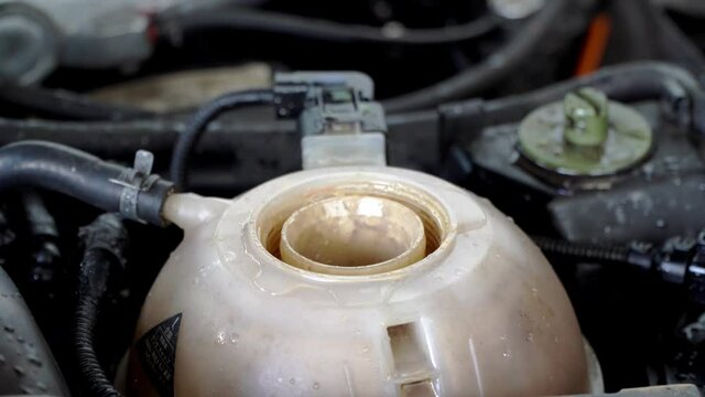 car radiator tank is boiling.car overheating causes the radiator to boil.