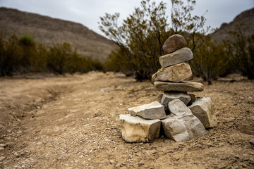 Stacked Rock Cairn On Side of Dirt Trail