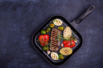 Fried beef steak with vegetables.