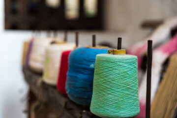Esporles, Mallorca - Spain - 12 26 2017: Colorful cotton thread at the La Granja, the farm museum