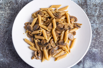 Pasta with mushrooms. Ideal dish for a vegan diet.