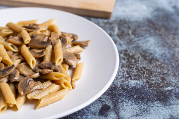Pasta with mushrooms. Ideal dish for a vegan diet.