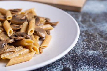 Pasta with mushrooms. Ideal dish for a vegan diet.
