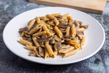 Pasta with mushrooms. Ideal dish for a vegan diet.