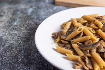 Pasta with mushrooms. Ideal dish for a vegan diet.