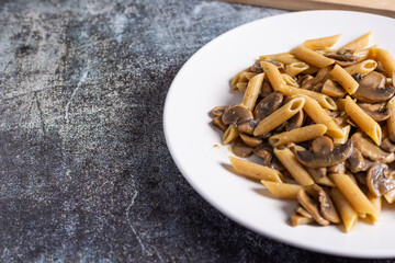 Pasta with mushrooms. Ideal dish for a vegan diet.