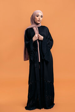 Young muslim woman looking at camera.