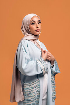 Young muslim woman looking at camera.