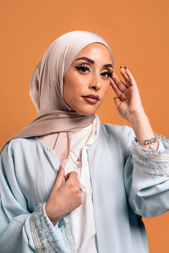 Young muslim woman looking at camera.