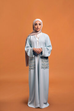 Young muslim woman looking at camera.