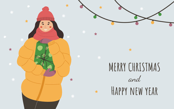Christmas card with chinese woman with gift box. Young woman in cap and scarf are holding gift. New year concept.
