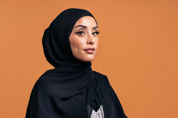 Young muslim woman looking at camera.