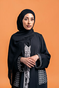 Young muslim woman looking at camera.