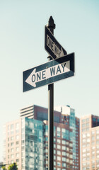 One Way road signs in New York City, selective focus, color toning applied, USA.