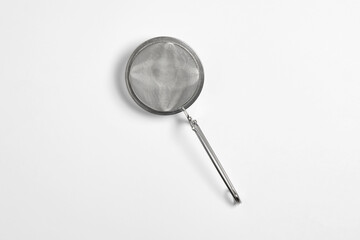 Stainless tea strainer. Still life of kitchenware.High-resolution photo.Top view.Mockup