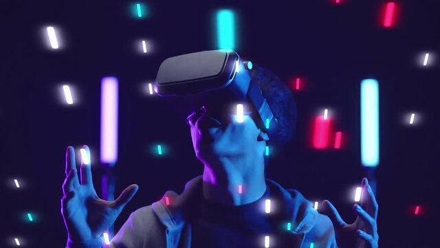 Metaverse VR virtual reality game playing, man play metaverse virtual digital world technology game control with VR goggle future digital technology