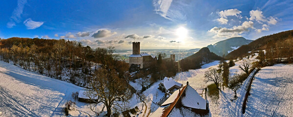 Winter panorama with Neu Bechburg castle. Village of Oensingen, Switzerland