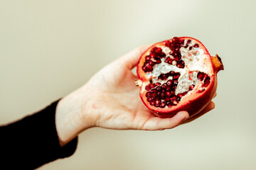 pomegranate in hand