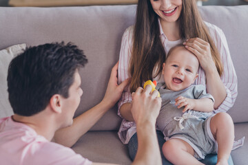 Photo of glad little funny kids enjoy father game wear casual outfit in comfortable apartment home...