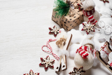 Christmas concept background with copy space. Christmas decorations on the white wooden table background.
