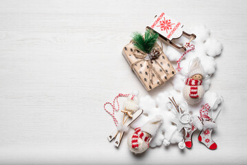 Christmas concept background with copy space. Christmas decorations on the white wooden table background.