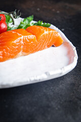 salmon slice red fish seafood meal snack pescetarian diet on the table copy space food background rustic. top view keto or paleo diet vegetarian food