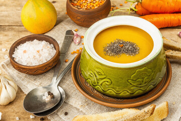 Vegetable cream soup. Traditional autumn hot food, croutons, and spices