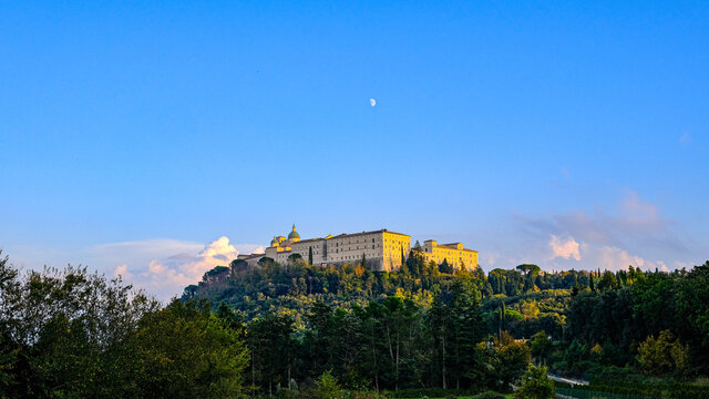 View of the Abbey of MonteCassino, Latium, Italy. Abbey at sunset with moon and blue sky