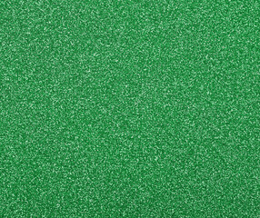 Abstract background texture of green glitter