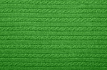 Background texture of green knitted wool fabric - obrazy, fototapety, plakaty