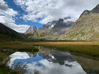 Amazing mountain reflection in a small lake, TMB, Val Veny, Italy