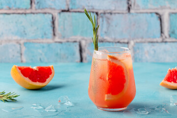 Cold lemonade/cocktail of fresh grapefruit juice.