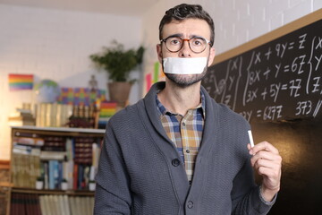 Censored school teacher feeling the oppression  - obrazy, fototapety, plakaty