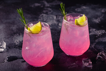 Refreshing pink drink or cocktail with ice