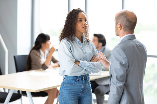 furious businesswoman arguing strongly, having disagreement and conflict for works in meeting room